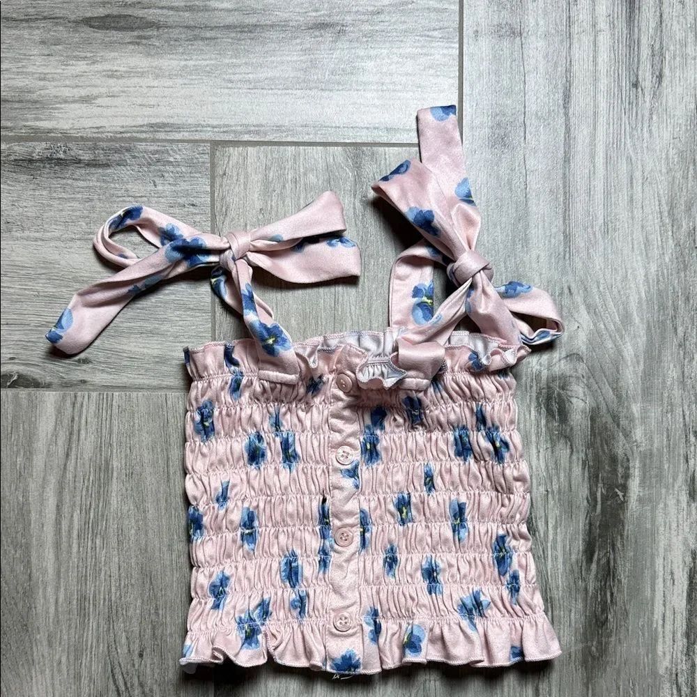 Chic Pink Smocked Tank Top with Blue Floral Accents